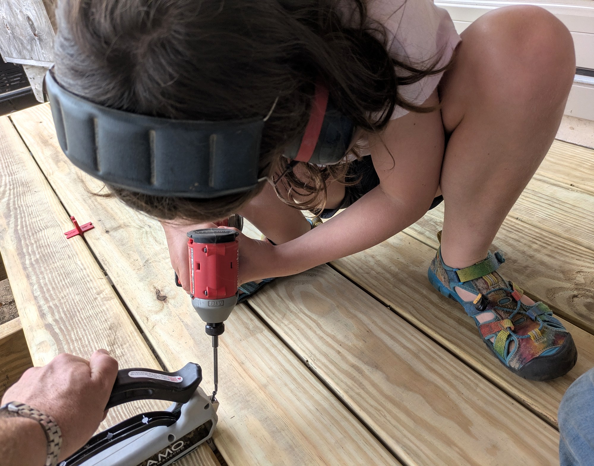 Helping on the deck